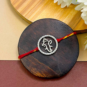 "Gannushri" Silver Look Alike Oxidized Rakhi "Gannushri" Silver Look Alike Oxidized Rakhi
