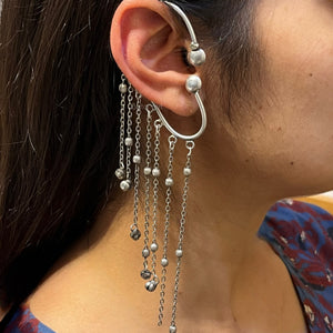 ear cuff with dangling beads and chains ear cuff with dangling beads and chains