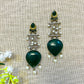 silver earrings with green stone