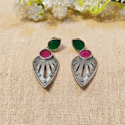 silver earrings with green and pink stones