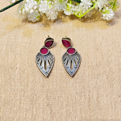 silver earrings with red stone