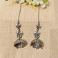 silver earrings with elephant designs