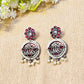 ornate earrings with gemstones