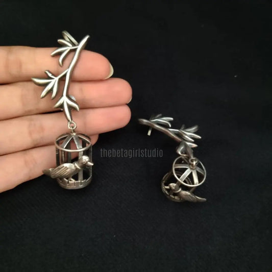 "Parrot Inside The Cage" Silver Look Alike Oxidised Earcuff